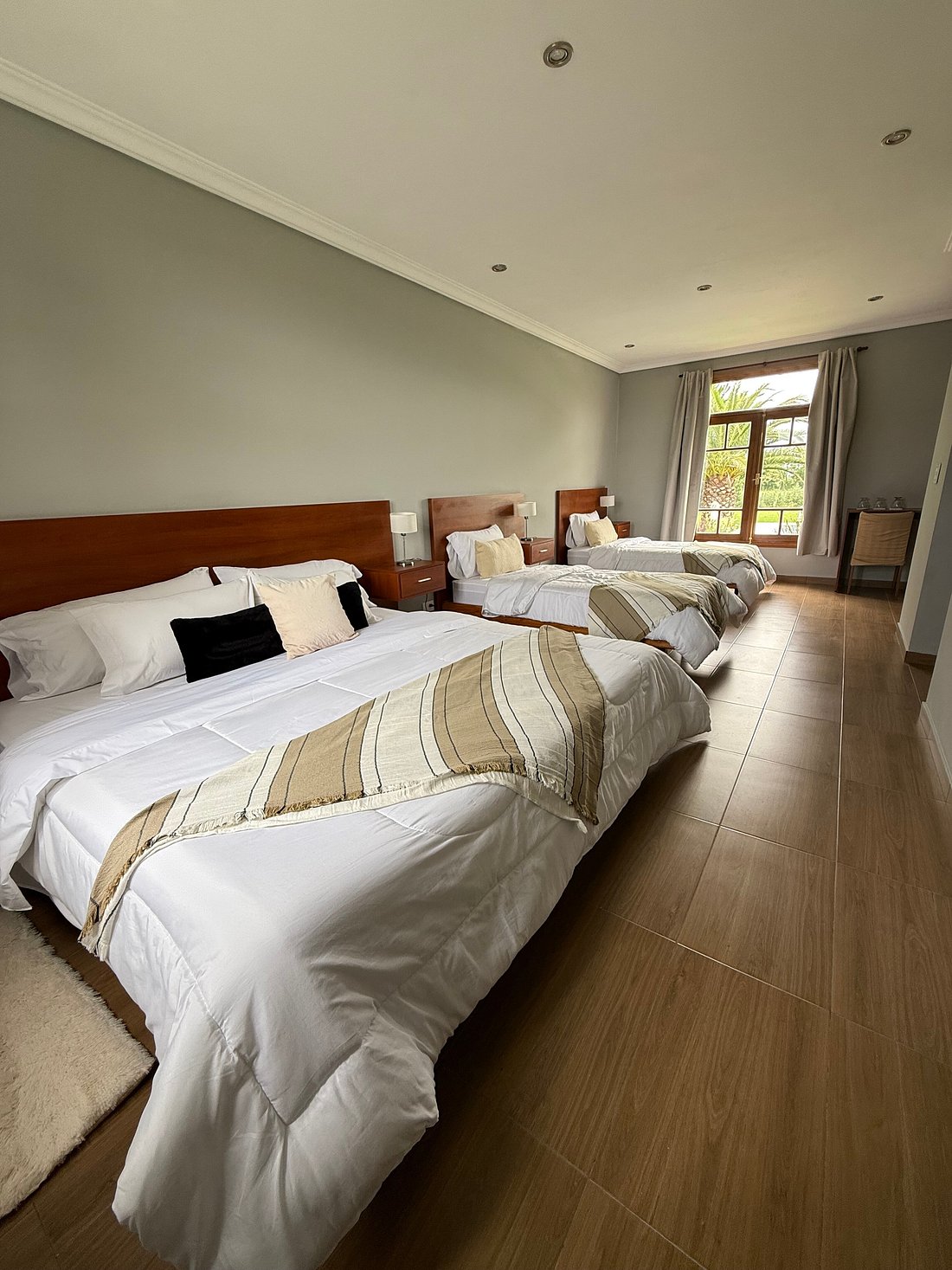 Habitación premium con tres camas